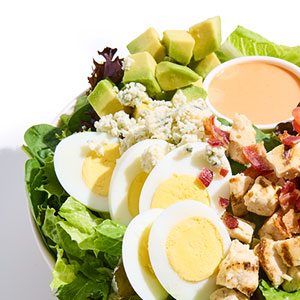 avocado cobb salad with egg, chicken and more