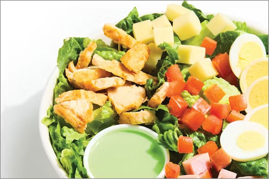 bently salad with smoked ham, roasted turkey, provolone cheese and more